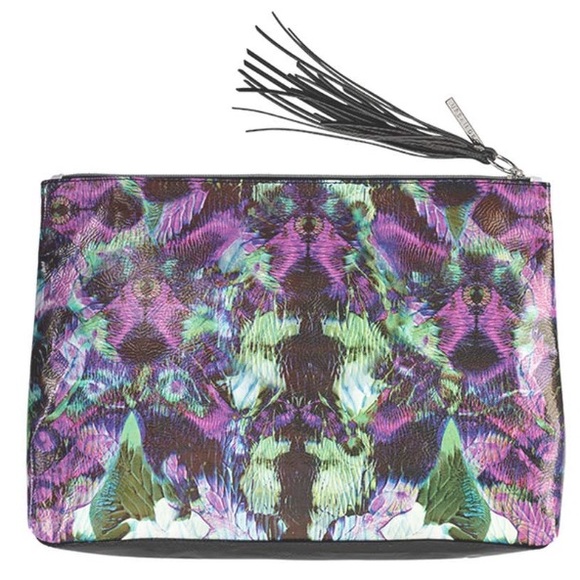 Urban Decay Handbags - NWT Urban Decay manic travel bag make up peacock